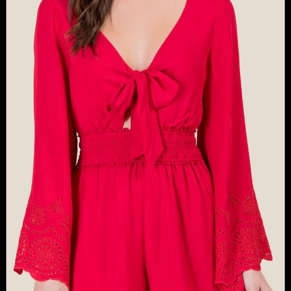 Red Ashlynn tie front romper with pockets